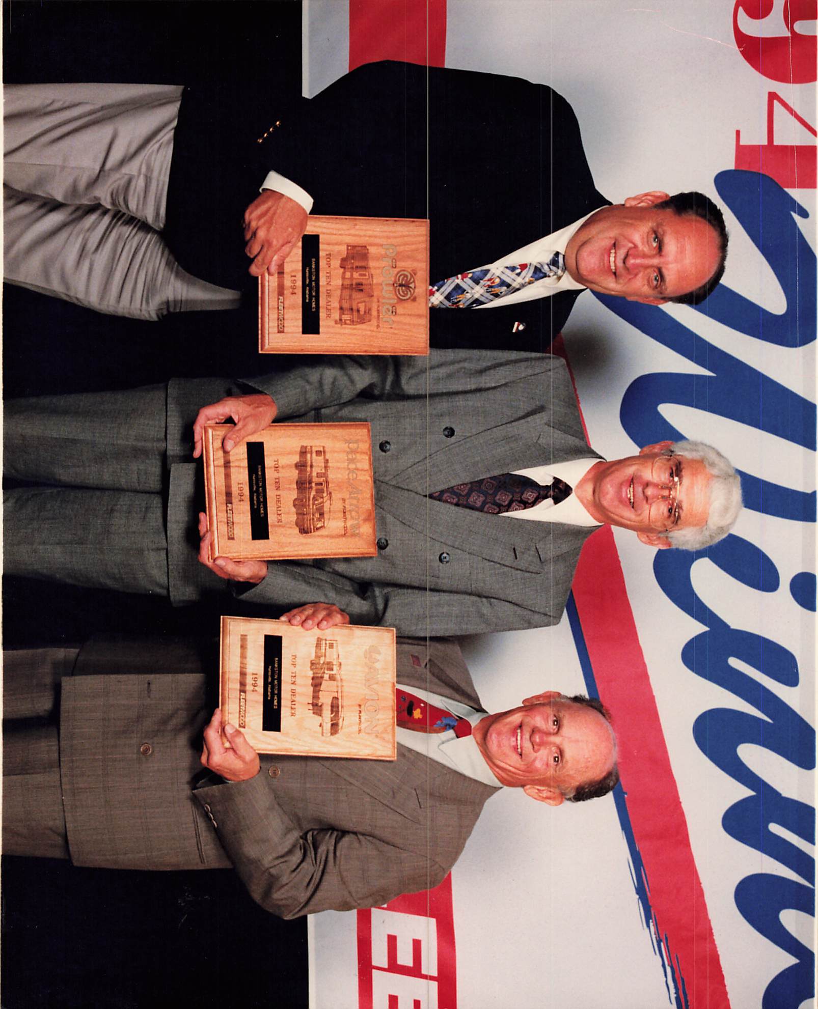 Dealership entrance with American flag and welcome